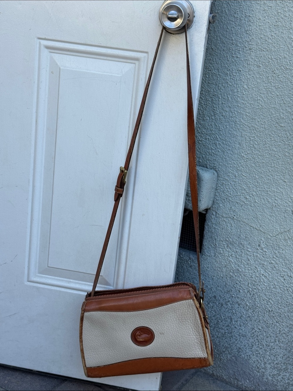 Dooney & Bourke Tan and Cream Leather Crossbody Messenger